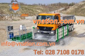 automatic wheel washer / ramp