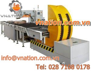 paper packaging machine / for steel coils / horizontal