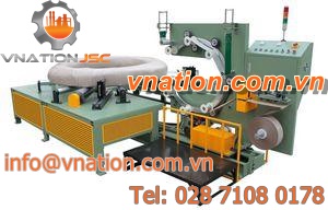 paper packaging machine / for wire coils / horizontal
