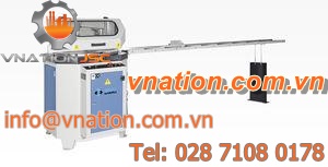 miter sawing machine / for profiles / with motorized head