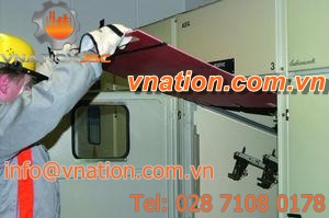 protective shield insulator for distribution switchgear