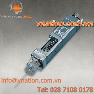 needle dispensing valve