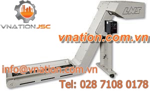chip conveyor / inclined / transport