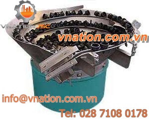 parts conveyor / vibrating helical / horizontal / transport