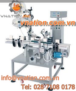 side labeler / linear / for cylindrical products / automatic