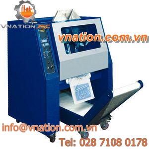 VFFS bagging machine / semi-automatic / for magazines and newspapers / multipack