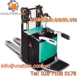 electric pallet truck / stand-on / for warehouses / with platform
