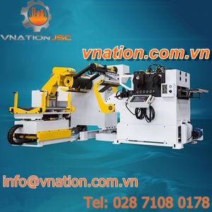 automatic feeder-positioner