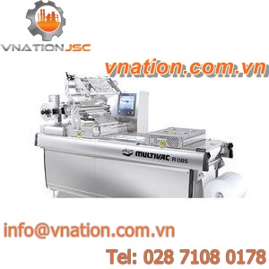 roll-fed thermoforming machine / modified atmosphere packaging / automated / industrial