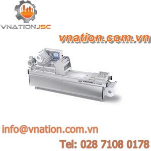 roll-fed thermoforming machine / for packaging / for MAP packaging / automated