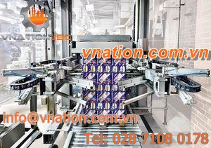 articulated palletizer / layer / low level infeed / tray