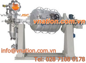 vacuum dryer / for plastic pellets / cylindrical / rotary