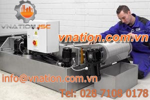 belt filter / self-cleaning / continuous / for coolant