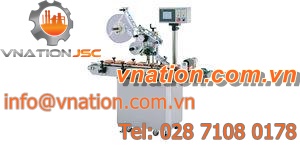 automatic labelling machine / top / for flat products / horizontal