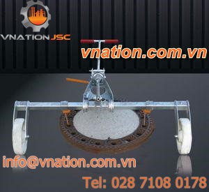 hydraulic manhole cover lifter