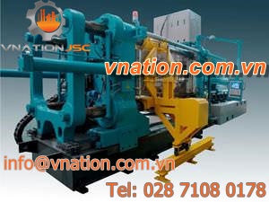 horizontal injection molding machine / hydraulic / for elastomers / bi-material