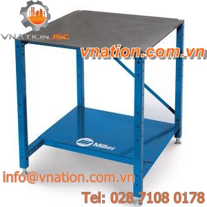 height-adjustable workstation / for welding