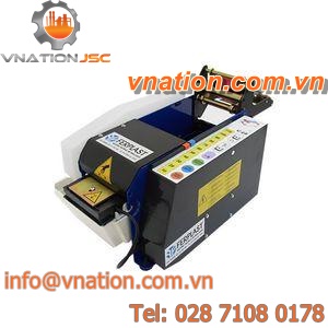 motorized dispenser / for gummed paper / compact