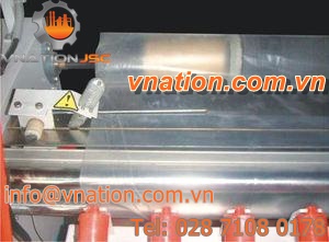 fabric roll packaging machine / with sealing bar / semi-automatic / for the textile industry
