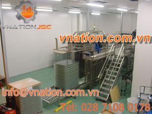 bottle packaging line / with automatic feeder / for the food industry