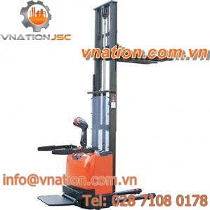 electric stacker truck / stand-on / for warehouses / for lifting
