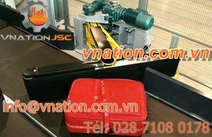 pivot arm sorter / vertical / baggage