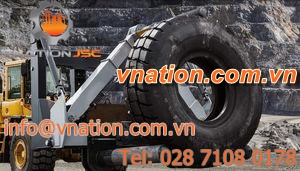 hydraulic manipulator / with gripping tool / for tires / mining