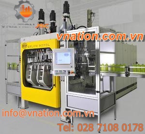twin-station blow molding machine / for hollow plastic parts