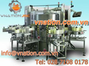 top labeler / rotary / for self-adhesive labels / high-speed