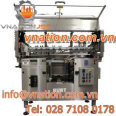 cylindrical product labeler / for the food and beverage industry / horizontal