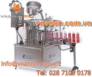 rotary filler and capper / for liquids
