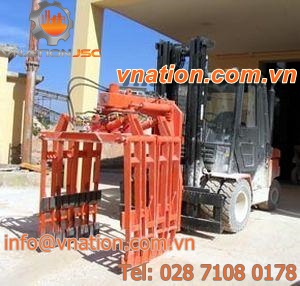 manipulator with gripping tool / concrete block / for forklift trucks