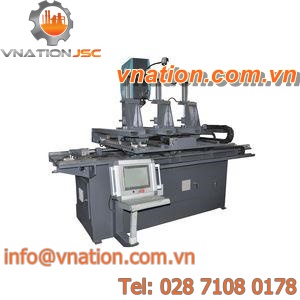 band sawing machine / for sheet metal / for flexible PU foam blocks / with cooling system