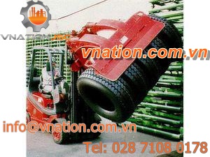 manipulator with clamping system / for tires / for forklift trucks / handling