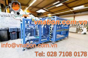 hose coiler / automatic / for extrusion lines