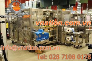 wraparound cartoner-sleeve wrapping machine