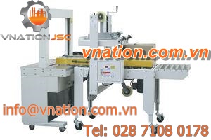 carton strapping machine / lateral / automatic