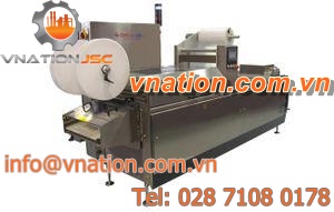 roll-fed thermoforming machine / for MAP packaging / for packaging / automated