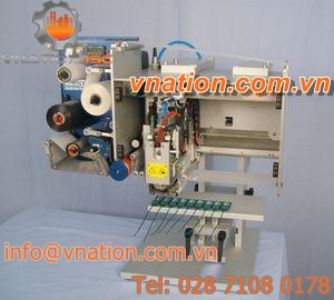 automatic labeler / for flat products / in-line