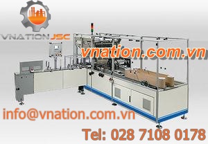 foil packaging machine / fabric / PLC-controlled / for the textile industry