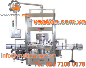 automatic labeler / top / for self-adhesive labels / rotary