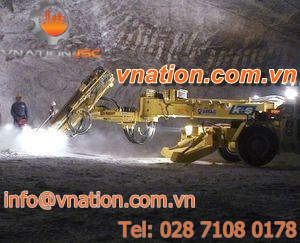 blasthole drilling rig / wheel-mounted / down-the-hole / rotary