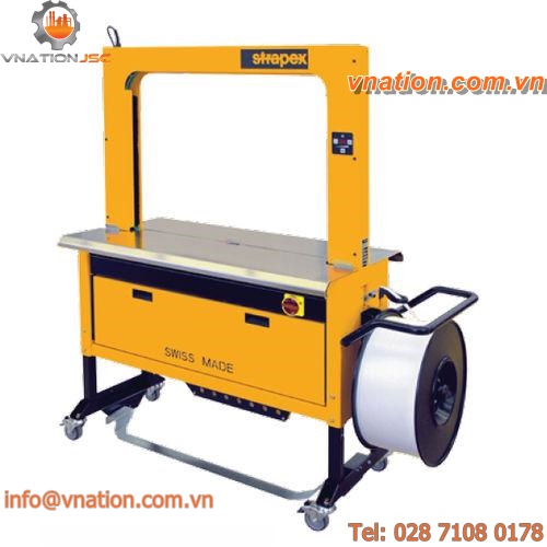 horizontal strapping machine / cardboard box / for corrugated cartons / automatic