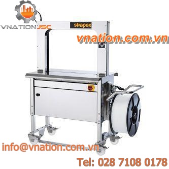 horizontal strapping machine / for food products / stainless steel / automatic