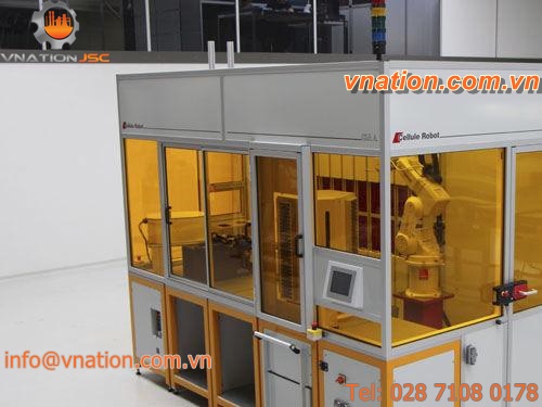 unloading robotic cell / loading