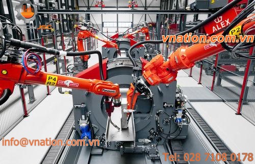 fully-automatic assembly line / for welding / handling / drilling