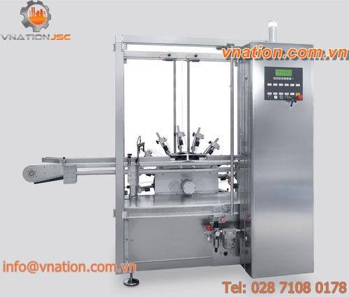 dry cleaning machine / rotating table / vertical / continuous