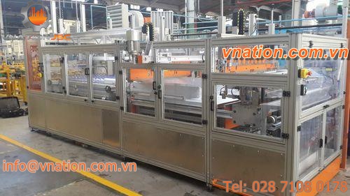 film packaging machine / for empty PET/HDPE bottles / automatic