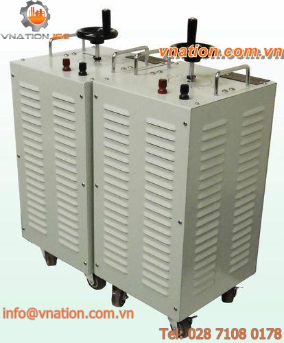 housed rheostat / mounted in tandem / booster