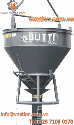 concrete skip with discharge hose